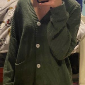 green sweater
